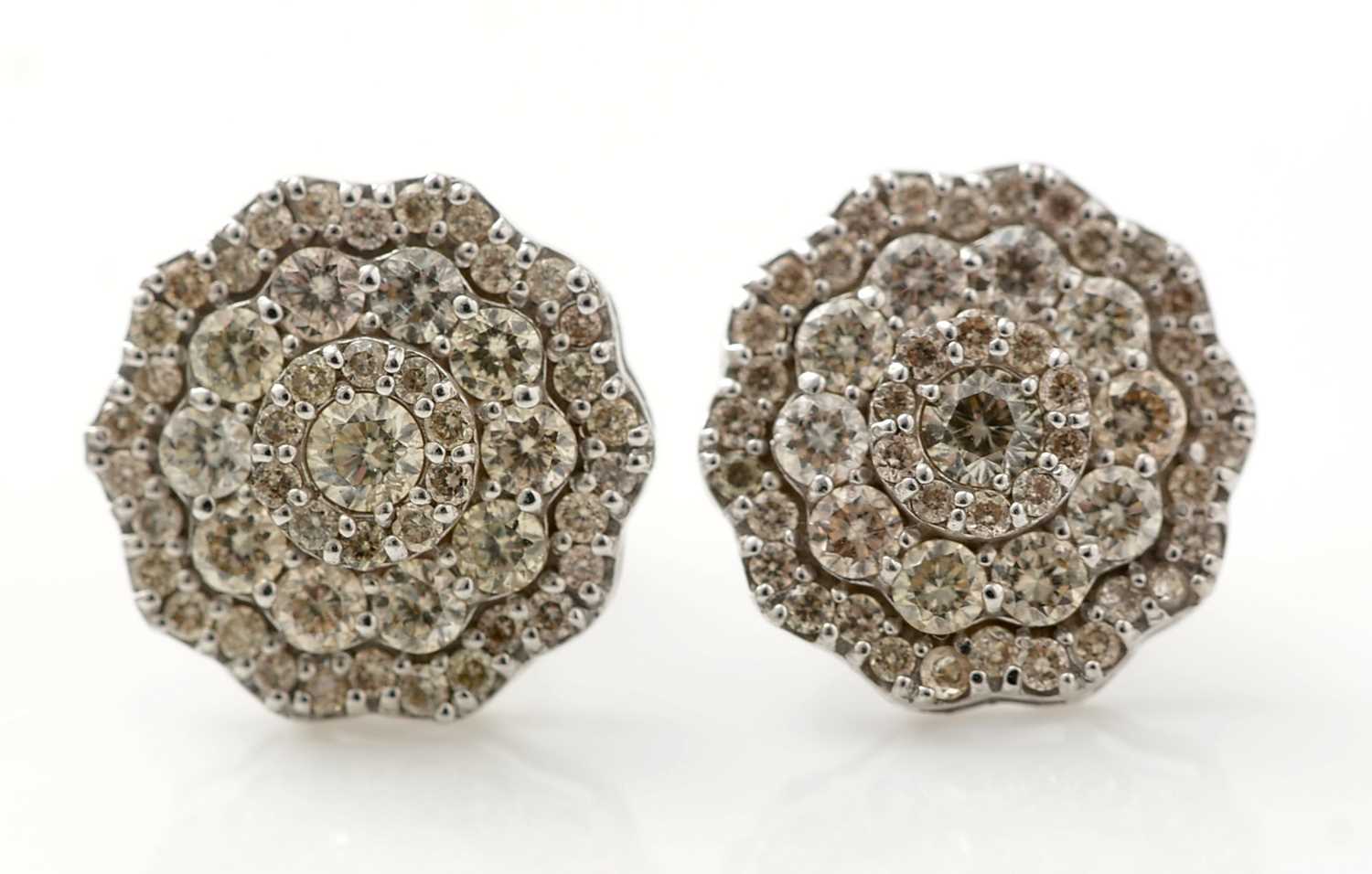 Lot 156 - A pair of diamond earrings