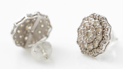 Lot 156 - A pair of diamond earrings