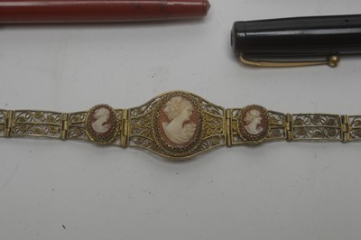 Lot 178 - A silver bangle;  a silver gilt filagree and carved shell cameo bracelet and other items