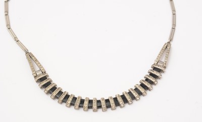 Lot 7 - A 1930s Art Deco monochromatic ear pendant and necklace set