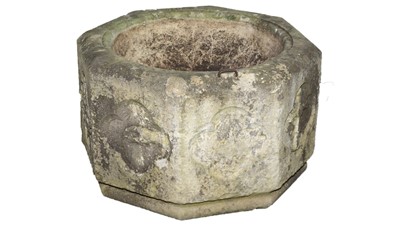 Lot 537 - A 20th Century carved sandstone octagonal baptismal font