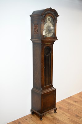 Lot 22 - A 20th Century oak longcase / grandfather clock