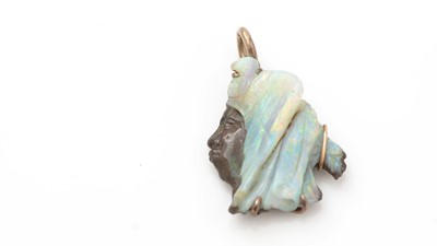 Lot 507 - A carved opal pendant