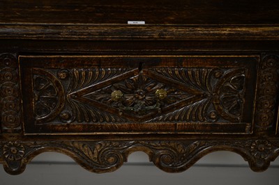Lot 66 - A 19th Century carved oak dresser