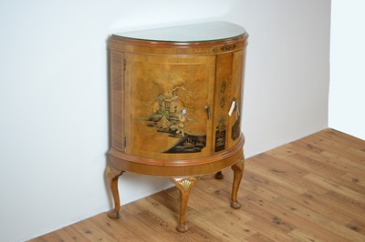 Lot 4 - A 20th Century demi lune walnut cabinet with chinoiserie detailing