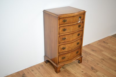 Lot 2 - A Georgian-style burr walnut serpentine chest of drawers