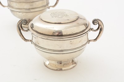 Lot 70 - A matched pair of Edwardian George V silver two handled cups