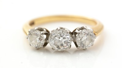 Lot 402 - A three-stone diamond ring