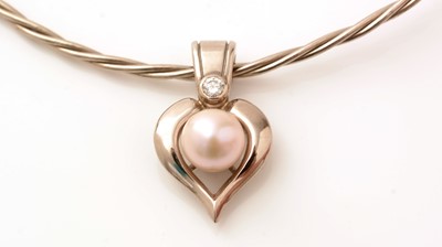 Lot 409 - A diamond, pearl and 18ct white gold pendant necklace