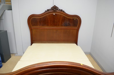 Lot 72 - A 20th Century French carved hardwood double bed