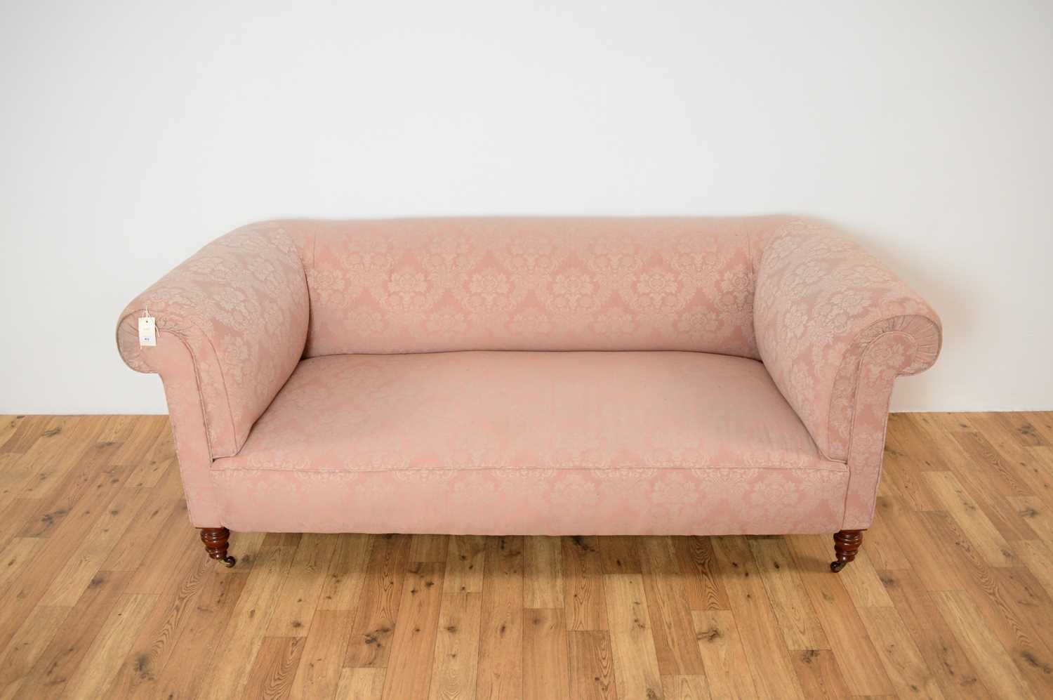 Lot 43 - A 19th Century Victorian two person sofa upholstered in pink damask fabric