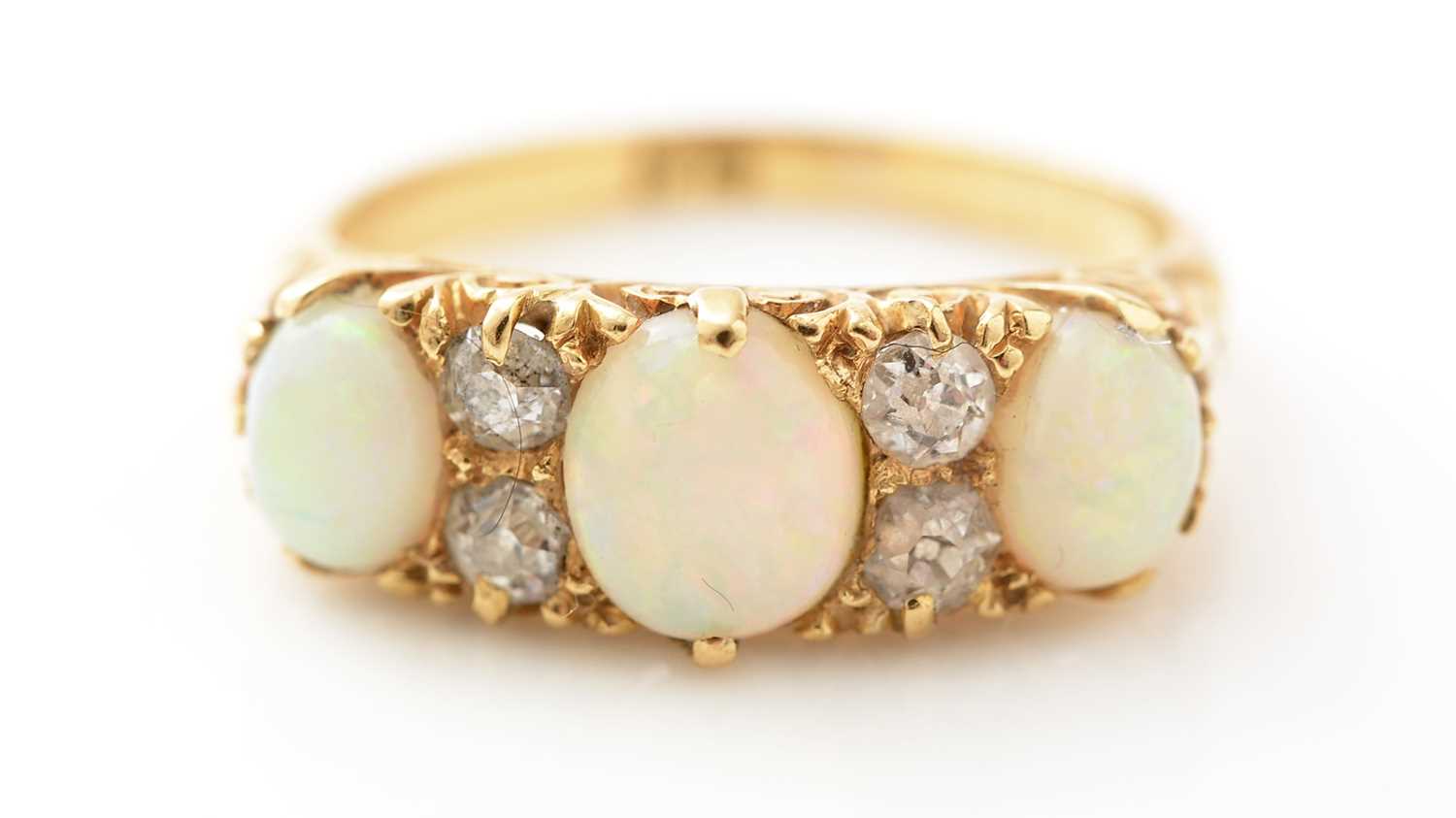 Lot 418 - A Victorian opal and diamond ring