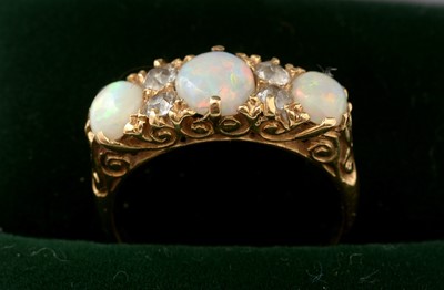 Lot 418 - A Victorian opal and diamond ring