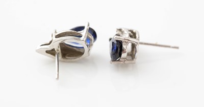 Lot 421 - A pair of sapphire and diamond earrings