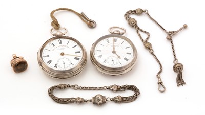 Lot 187 - Two silver cased open faced pocket watches, a watch chain and fob