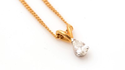 Lot 165 - A pear cut diamond single stone drop pendant