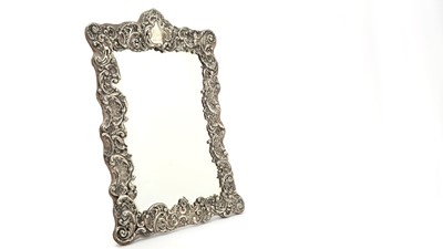 Lot 90 - An Edwardian silver mounted dressing table mirror