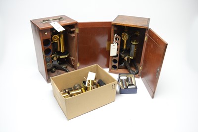 Lot 327 - Two Swift and Son student microscopes.