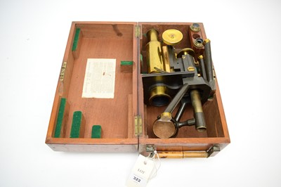 Lot 322 - A brass lacquered microscope, by J. Swift & Son, London, in stained wood carry case.