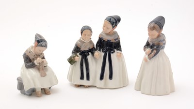 Lot 733 - Three Royal Copenhagen figures of Amager Girls