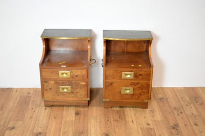Lot 16 - A pair of 20th Century maple veneered leather topped bedside cabinets