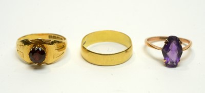 Lot 179 - Three rings, one amethyst and one garnet