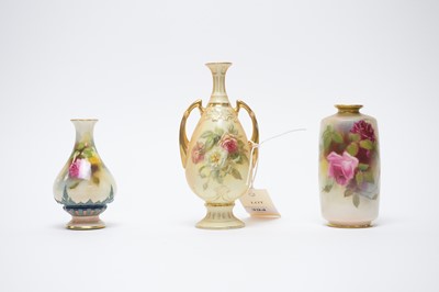 Lot 394 - A Royal Worcester blush ivory vase and two others.