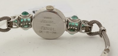 Lot 606 - An Art Deco emerald and diamond cocktail watch