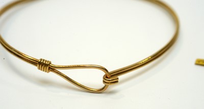 Lot 202 - Gold bangle and chains