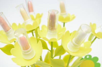 Lot 134 - A 1960s Max Factor "Fancy Plants" California Lip Colour Collection "Flower Power" lipstick bouquet