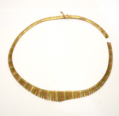 Lot 134 - A 9ct yellow, white and rose gold fringe necklace