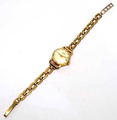 Lot 135 - A 9ct yellow gold Tissot cocktail watch