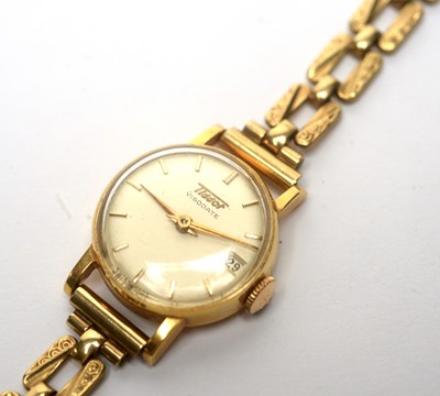 Lot 135 - A 9ct yellow gold Tissot cocktail watch
