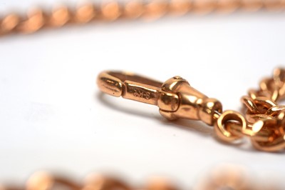Lot 140 - A 9ct rose gold Albert watch chain and T-bar.