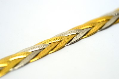 Lot 142 - A 9ct white and yellow gold bracelet