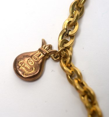 Lot 148 - A yellow gold charm bracelet