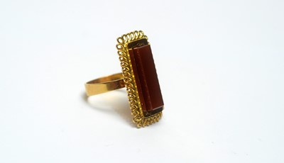 Lot 155 - A carnelian and 18ct gold ring