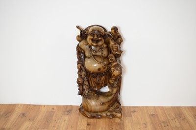 Lot 63 - A large and decorative 20th Century Chinese carved rootwood figure of a Buddha