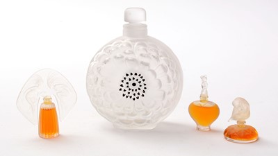 Lot 834 - Four Lalique scent bottles.