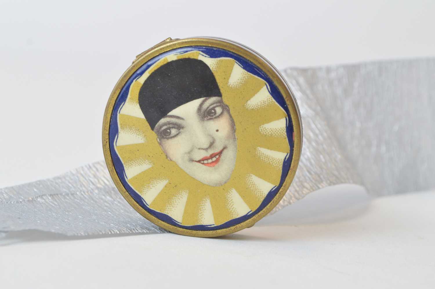 Lot 34 - A 1920s rare Tokalon loose powder compact depicting pantomime character Pierrot