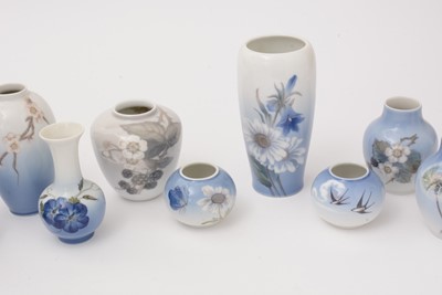 Lot 762 - Twelve small assorted Royal Copenhagen porcelain vases; and a small squat globular vase