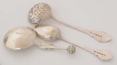 Lot 129 - A Victorian silver matching sugar sifter ladle and sugar spoon; and others