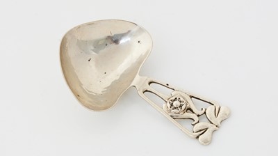 Lot 173 - An art nouveau silver caddy spoon