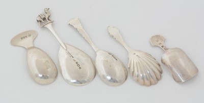 Lot 197 - A late Victorian silver caddy spoon and four other caddy spoons