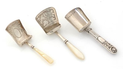 Lot 202 - Three various silver caddy scoops or shovels