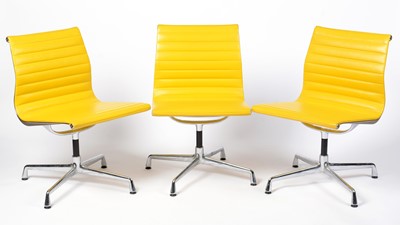 Lot 40 - A set of three contemporary Eames EA 105 style office chairs by Vitra