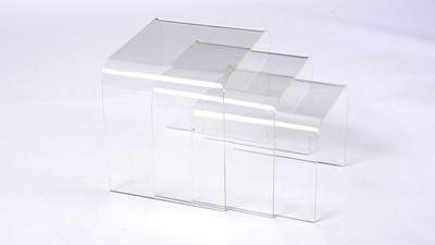 Lot 45 - A retro vintage clear acrylic nest of graduating tables