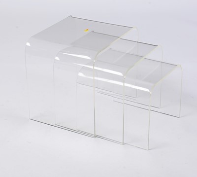Lot 45 - A retro vintage clear acrylic nest of graduating tables