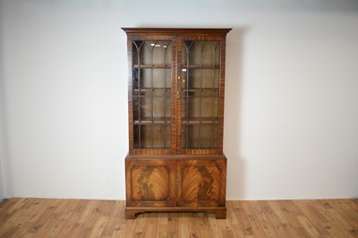 Lot 7 - A 20th century Georgian-style mahogany glazed bookcase