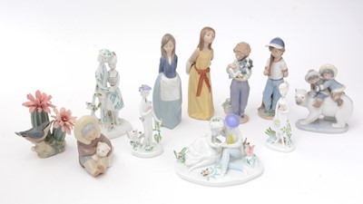 Lot 735 - Seven Lladro porcelain groups and figures, together with four Rosenthal porcelain figures and groups